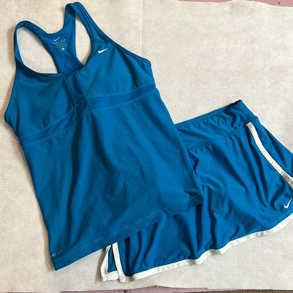 Nike Dri-Fit Athletic top and bottoms size large top and medium skirt.